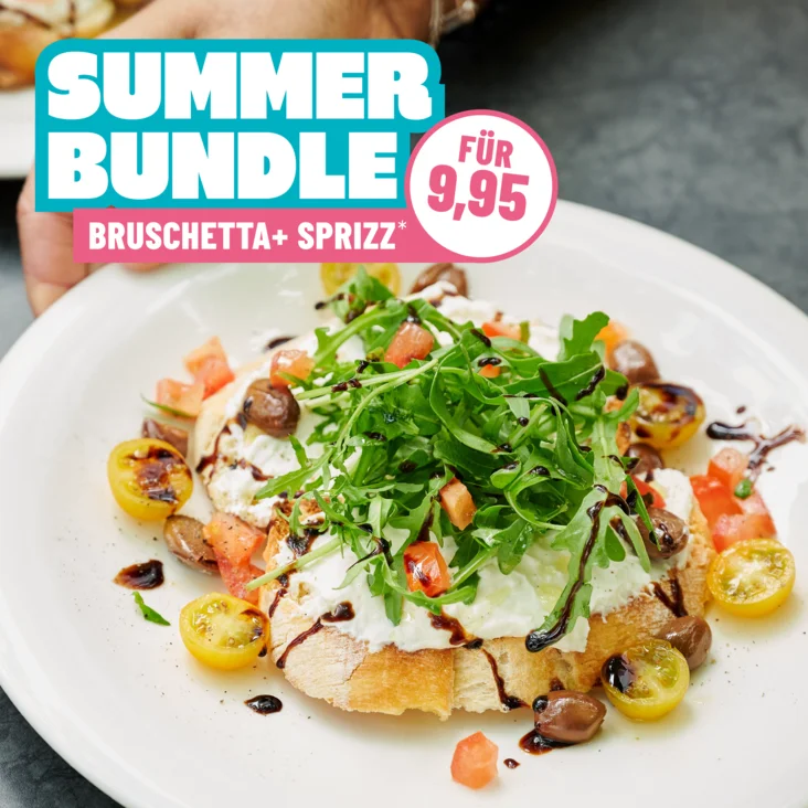 Eine Bruschetta mit Feta und der Aufschrift "Summer Bundle Bruschetta + Sprizz für 9,95"